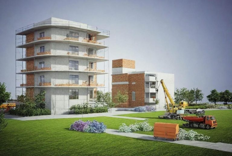 Moderne Wohngebäude mit Bauarbeiten und Landschaftsgestaltung im Vordergrund.